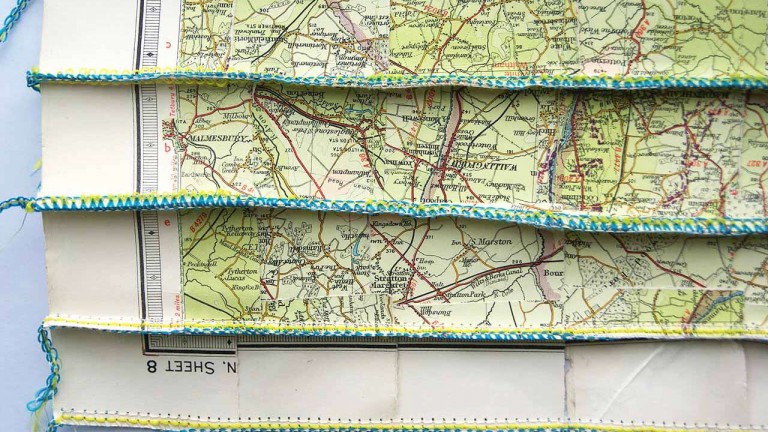 'With No Goal On and On', map pieces & stitching, 46 x 73 cm, 2013