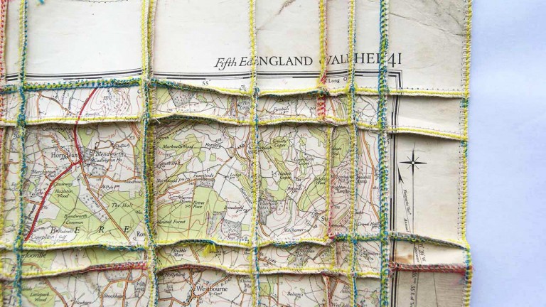 'I.O.W.', (detail), map pieces & stitching on paper, 64 x 77 cm, 2013