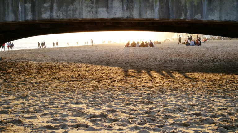 view under Bournemouth Pier at sunset in October