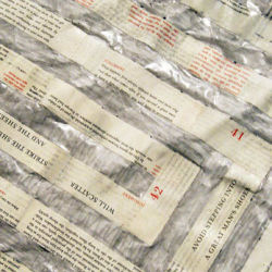 'The 48 Laws of Power' by David Greene reworked as a mixed media artwork by Michelle Rumney in the form of a Triple Meander Labyrinth', book pages on paper, photo showing artists work in progress
