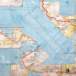 The Road to Tobemory, Scottish 7-Circuit Labyrinth, (detail), road atlas pages on paper, H150 x W150 cm, Dorset 2013 (Private collection, Austria) 'The Road to Tobemory', a mixed media contemporary artwork by Michelle Rumney in the form of a 7-Circuit Labyrinth, Scottish road atlas pages on paper, photo showing a detail view of the artist's finished unframed work