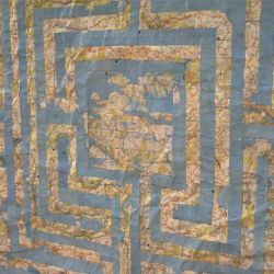 The Road to Tobemory, Scottish 7-Circuit Labyrinth, (detail), road atlas pages on paper, H150 x W150 cm, Dorset 2013 (Private collection, Austria) 'The Road to Tobemory', a mixed media contemporary artwork by Michelle Rumney in the form of a 7-Circuit Labyrinth, Scottish road atlas pages on paper, photo showing artists finished unframed work