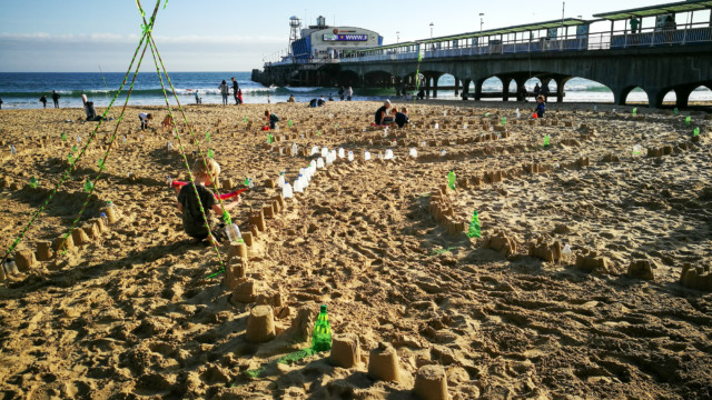 View from the pier of the Plastic Pathways Beach labyrinth on the sand for Arts by the Sea festival by artist Michelle Rumney