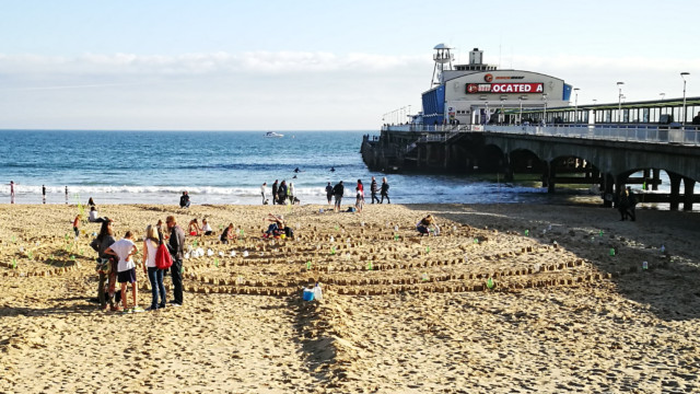 View of the sea from the Plastic Pathways Beach labyrinth on the sand for Arts by the Sea festival by artist Michelle Rumney
